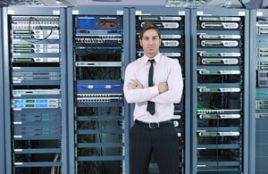 young handsome business man engeneer in datacenter server room-1